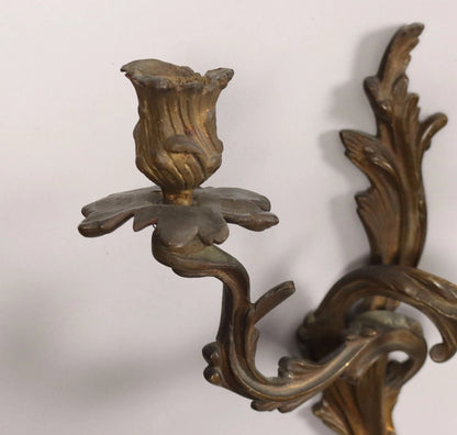 Gruppo di cinque applique a due luci in bronzo.  XIX secolo