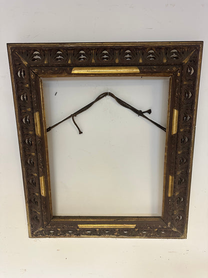 Cornice in legno traforato dorato ebanizzato.
Lombardia prima metà 800. 108 x 92