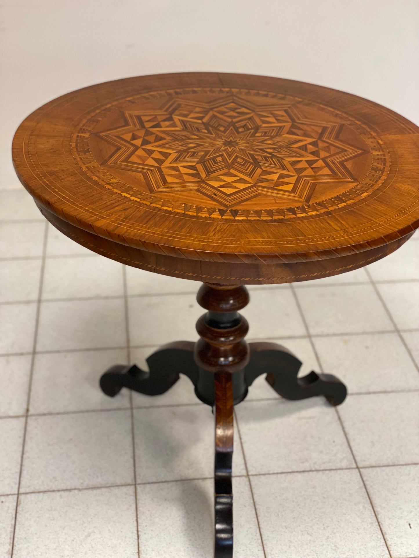 Inlaid Rolo table. 19th century
