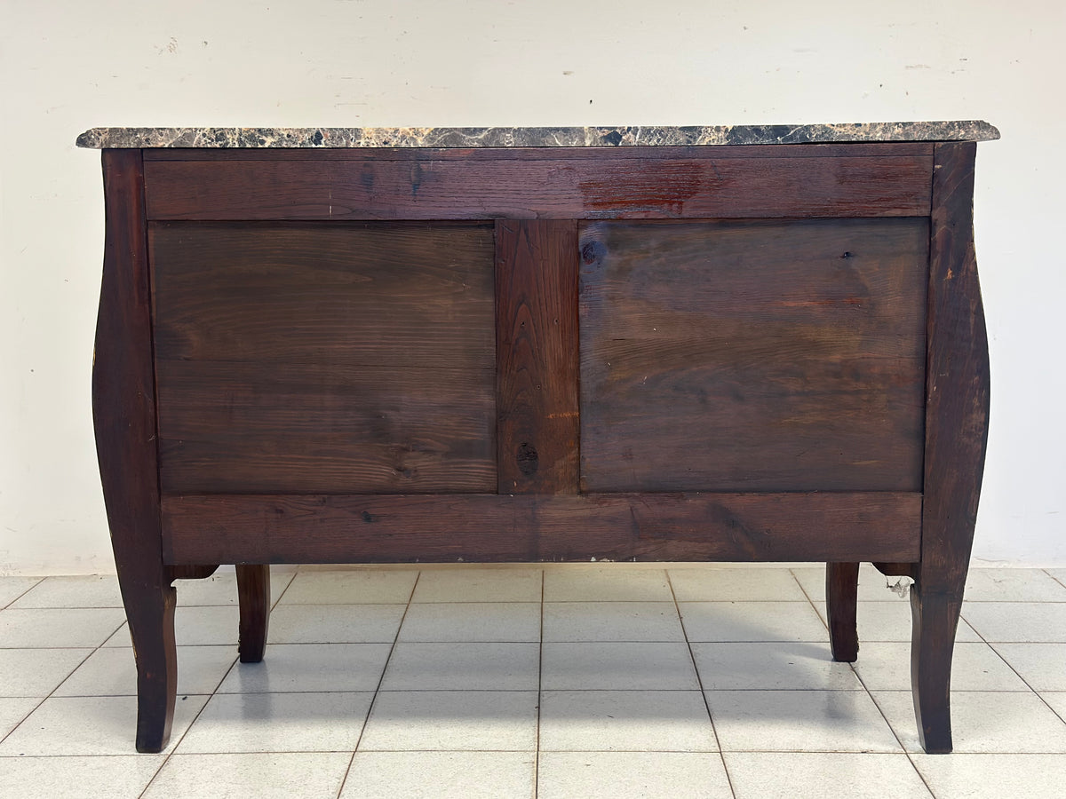 Cassettone a forma bombata bois  de rosa ebano viola 
XIX secolo Napoleone III (restaurato)