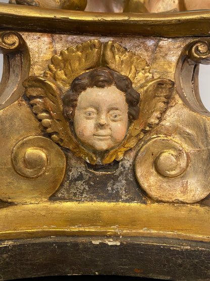 Angel candle holder lacquered gold in carved wood. Central Italy first half of the 17th century. Height 124 cm