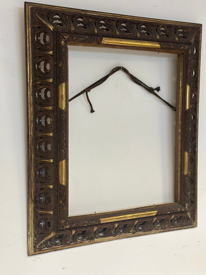 Cornice in legno traforato dorato ebanizzato.
Lombardia prima metà 800. 108 x 92
