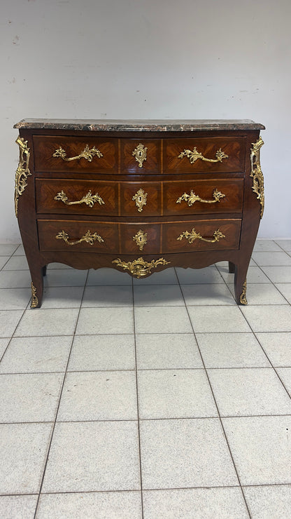 Cassettone a forma bombata bois  de rosa ebano viola 
XIX secolo Napoleone III (restaurato)
