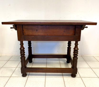 Bolognese walnut reel table. 17th century