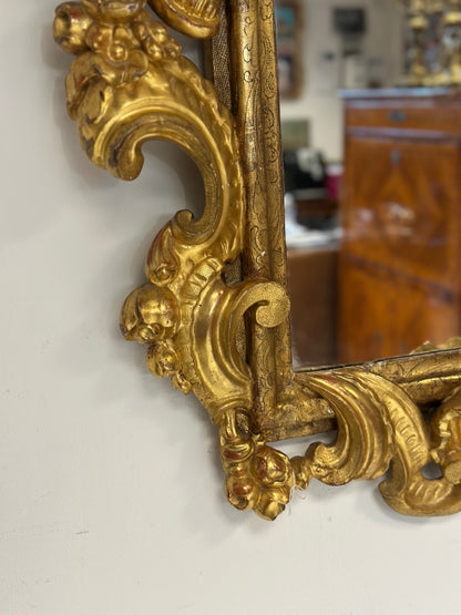 Specchiera emiliana in legno intagliato e dorato   Barocco XVII secolo
