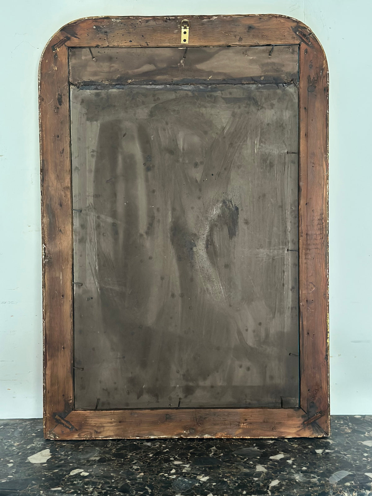 Specchiera  della seconda metà dell’800 in legno dorato Forma rettangolare con angoli stondati