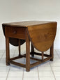 Walnut hinged table. 17th century