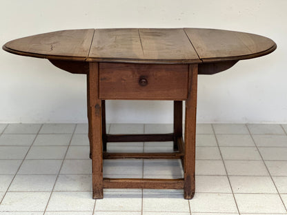 Walnut hinged table. 17th century
