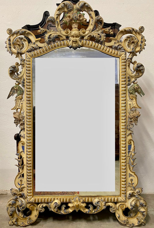 Carved wooden mirror, gilded and lacquered. Lombardy, Piedmont, early 19th century