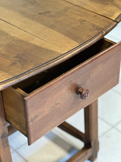 Walnut hinged table. 17th century