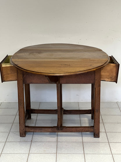 Walnut hinged table. 17th century
