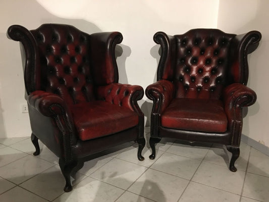 Coppia di poltrone Chesterfield in cuoio