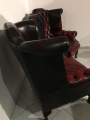 Coppia di poltrone Chesterfield in cuoio