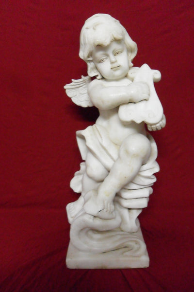 Angelo in marmo bianco Carrara.