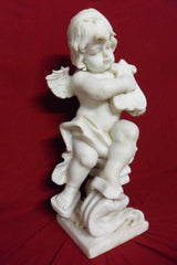 Angelo in marmo bianco Carrara.