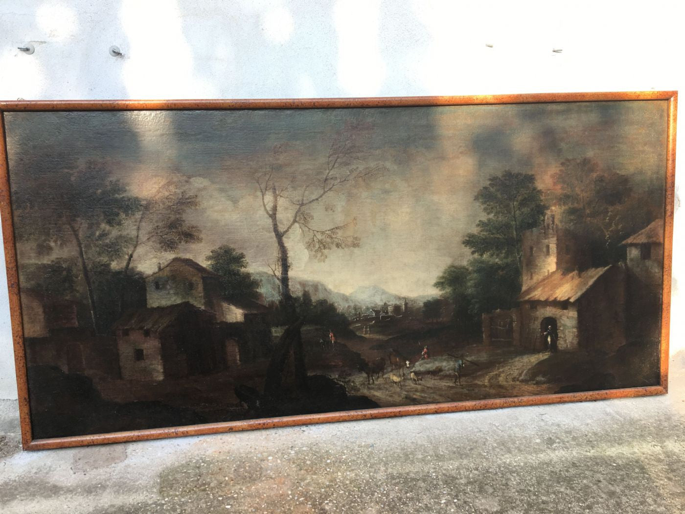Paesaggio rurale con case e contadini