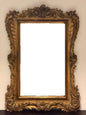 Carved and gilded wooden mirror. Lombardy 19th century