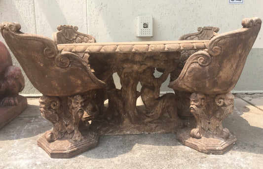 Tavolo ovale con putti poltrone a pozzetto . Anni 50