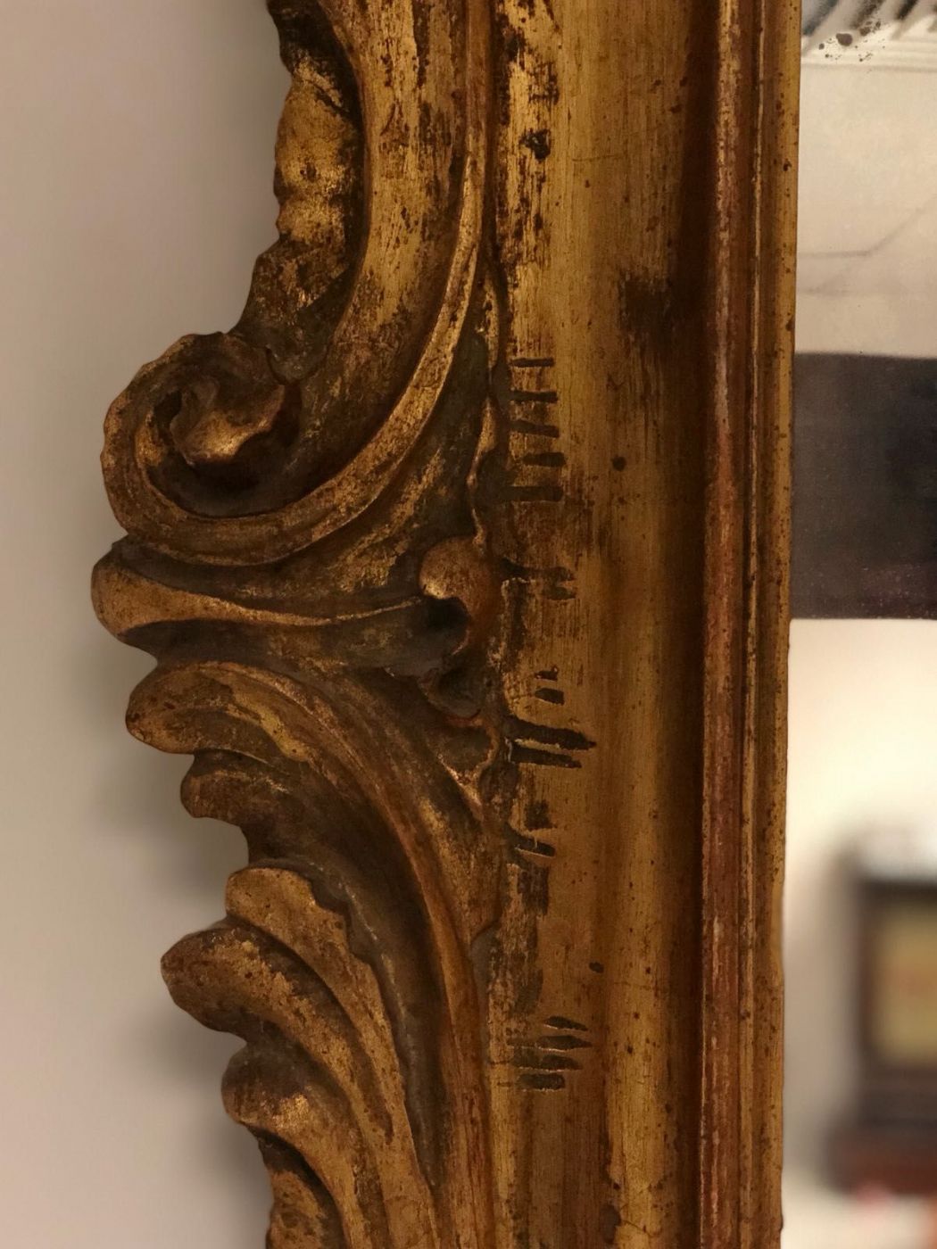 Carved and gilded wooden mirror. Lombardy 19th century