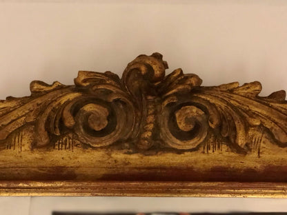 Carved and gilded wooden mirror. Lombardy 19th century