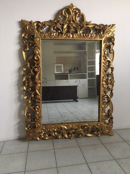Specchiera in legno intagliata e dorata in foglia oro XIX sec