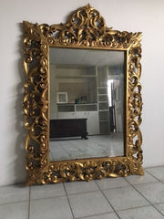 Specchiera in legno intagliata e dorata in foglia oro XIX sec
