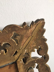 Specchiera in legno intagliata e dorata in foglia oro XIX sec
