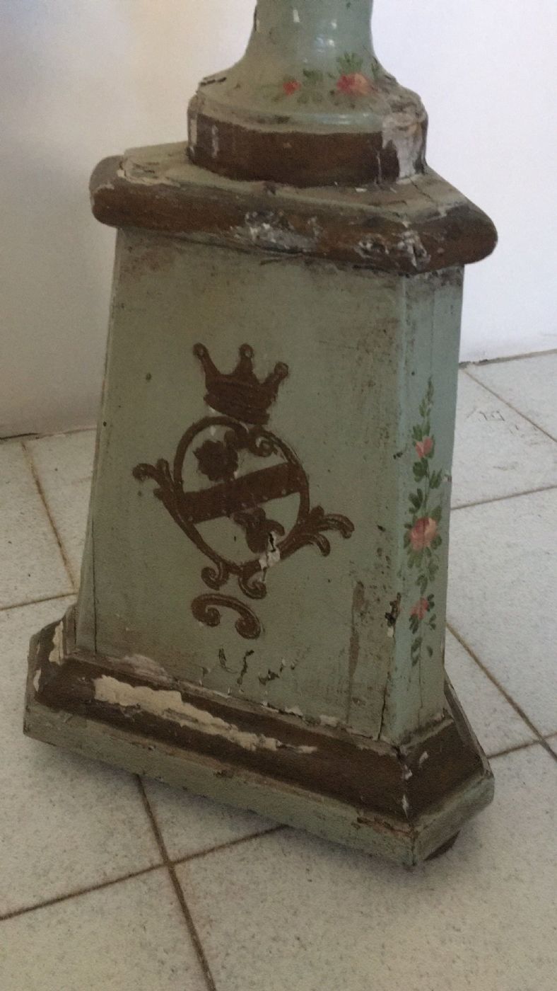 Lacquered and painted candlestick with noble coats of arms. 18th century
