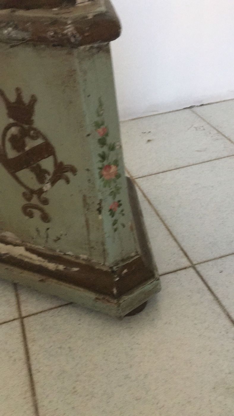 Lacquered and painted candlestick with noble coats of arms. 18th century