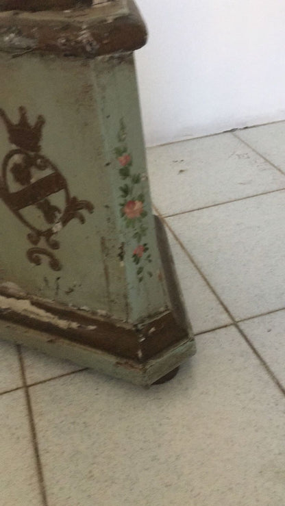 Lacquered and painted candlestick with noble coats of arms. 18th century