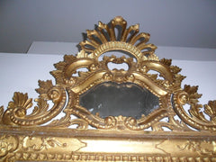 Specchiera lignea in oro finemente intagliata. Venezia 170 x 108