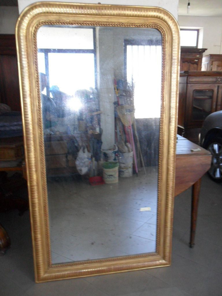 Large Charles X mirror in pure gold. Mercury glass 173 x 96
