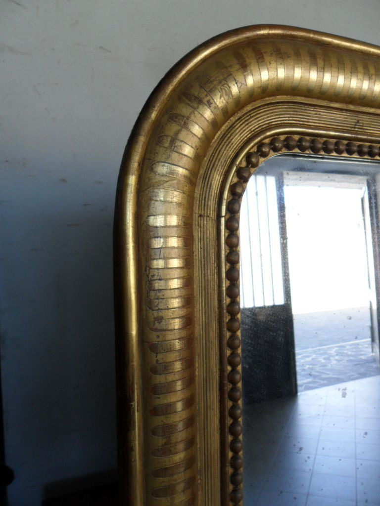 Large Charles X mirror in pure gold. Mercury glass 173 x 96