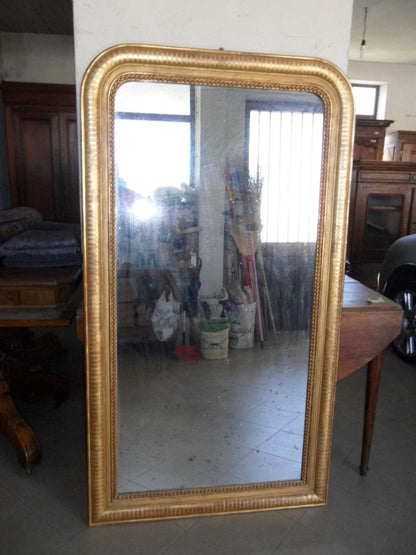Large Charles X mirror in pure gold. Mercury glass 173 x 96