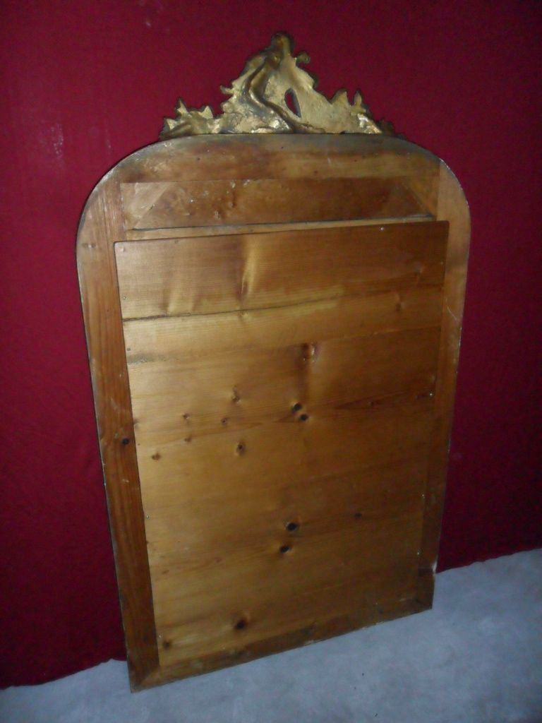 Specchiera intagliata e dorata (legno)
