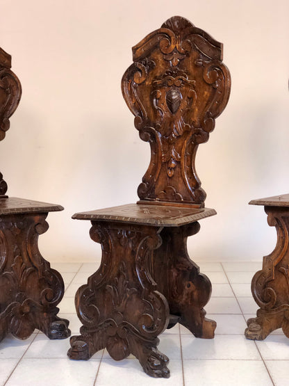 Group of three carved stools. 19th century