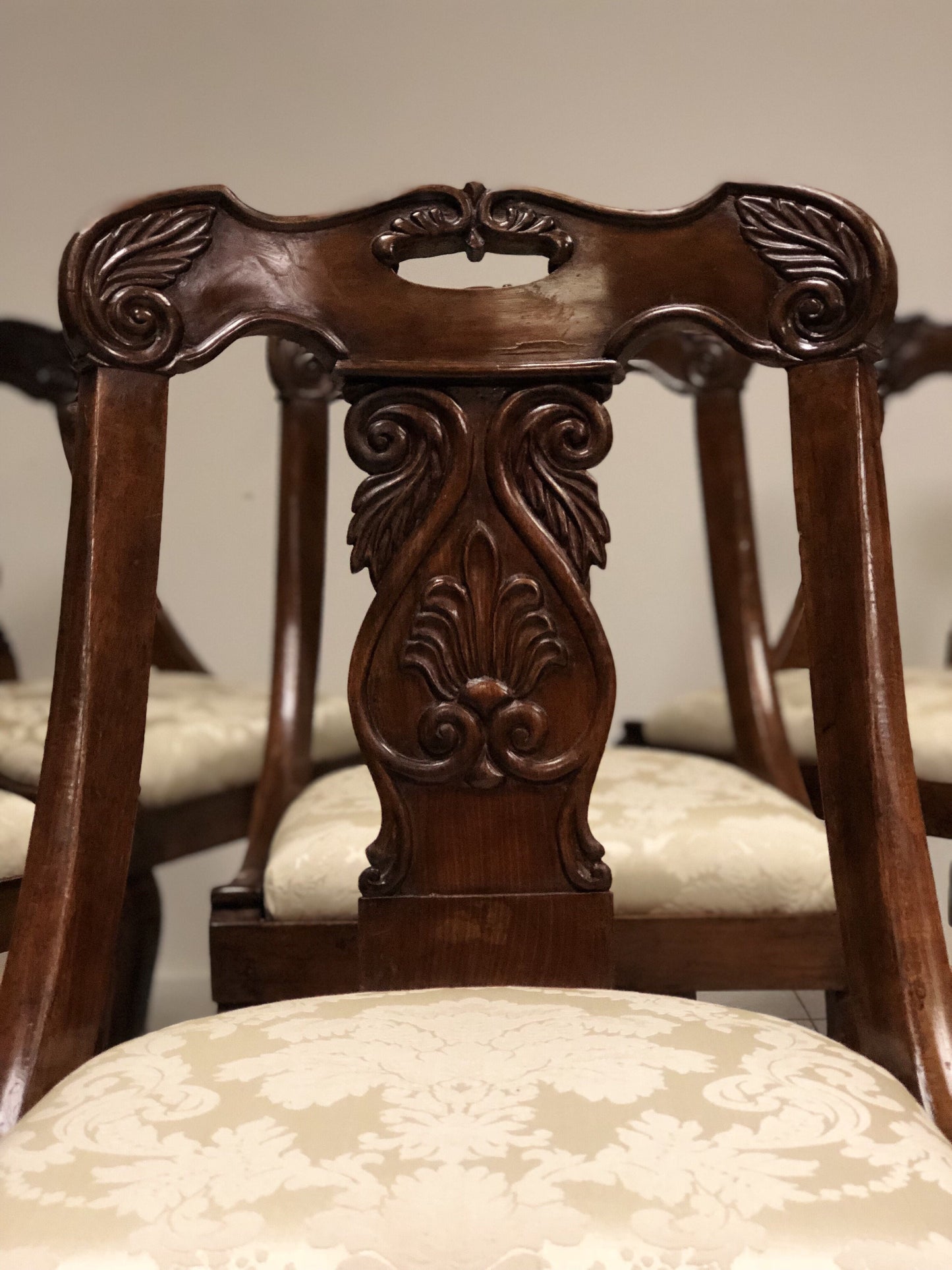 Six walnut gondola chairs. Early 19th century Lombardy
