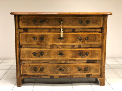Louis XV chest of drawers with curved front