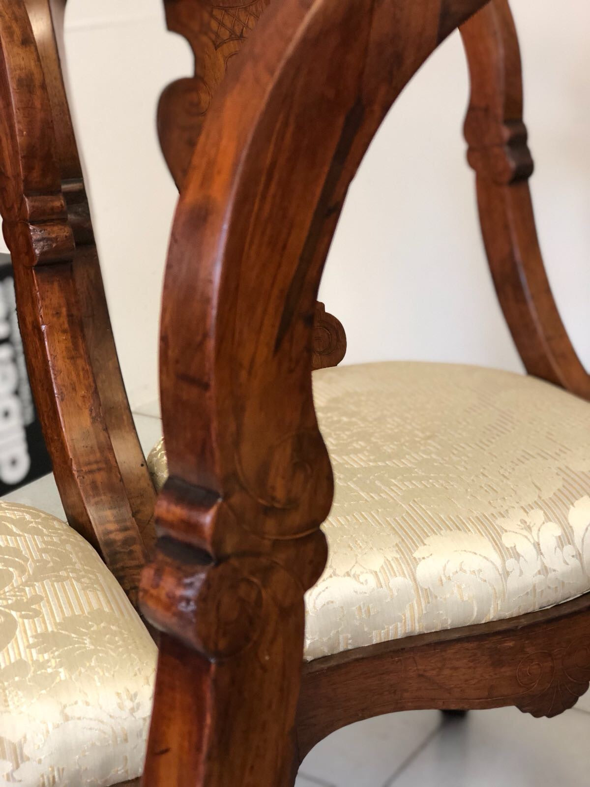 Group of six Lombard walnut gondola chairs. Charles X period