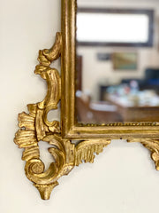 Specchiera in legno intagliato e dorato