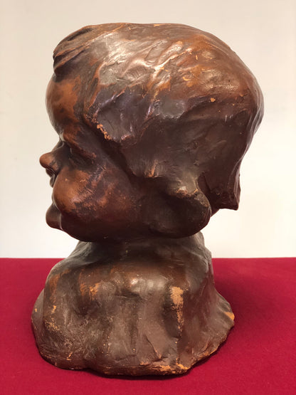 Testina di fanciullo in terracotta dell' 800
