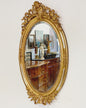 Lombard Charles X oval mirror in pure gold