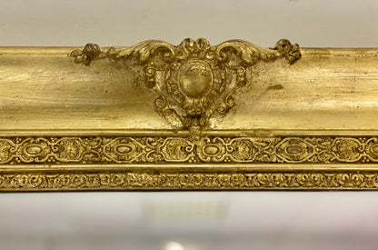 Specchiera in legno intagliato e dorato. Lombardia XIX secolo