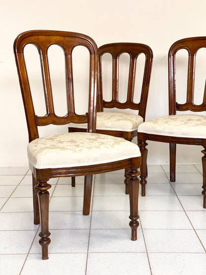 Group of four Lombard walnut chairs, mid-19th century