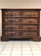 Walnut chest of drawers with cloverleaf. Genoa, 17th century