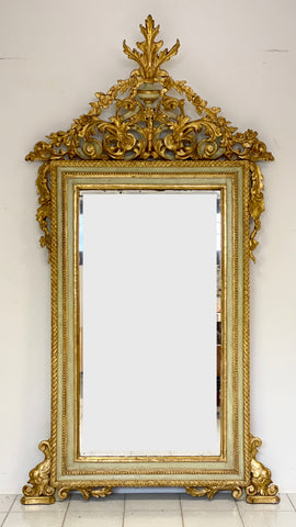 Specchiera lignea intagliata laccata dorata . Firenze fine XVIII secolo