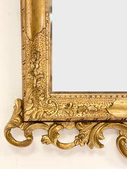 Specchiera veneziana in legno intagliato dorato. Fine XIX