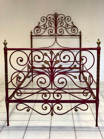 Wrought iron and lacquered and gilded bronze bed. Siena, early 19th century
