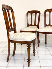 Gruppo di quattro sedie noce lombarde metà XIX secolo