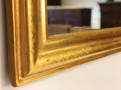 Specchiera in foglia oro zecchino con cimasa traforata